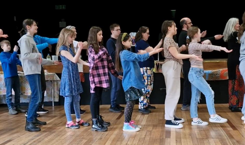 Young people dancing at Tea Party