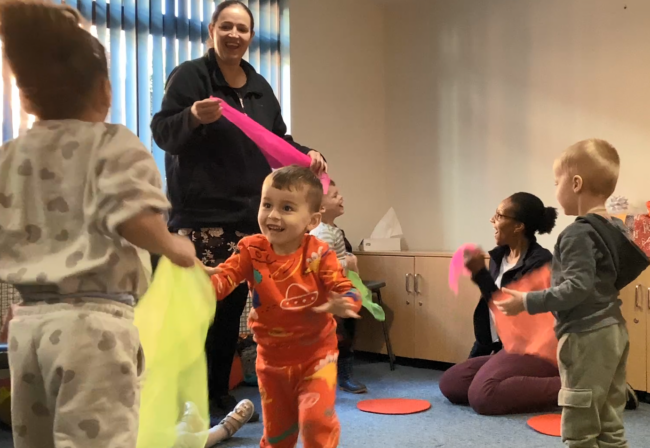children at a music and move session at Noah's Ark Nursery