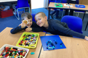 Children playing Lego