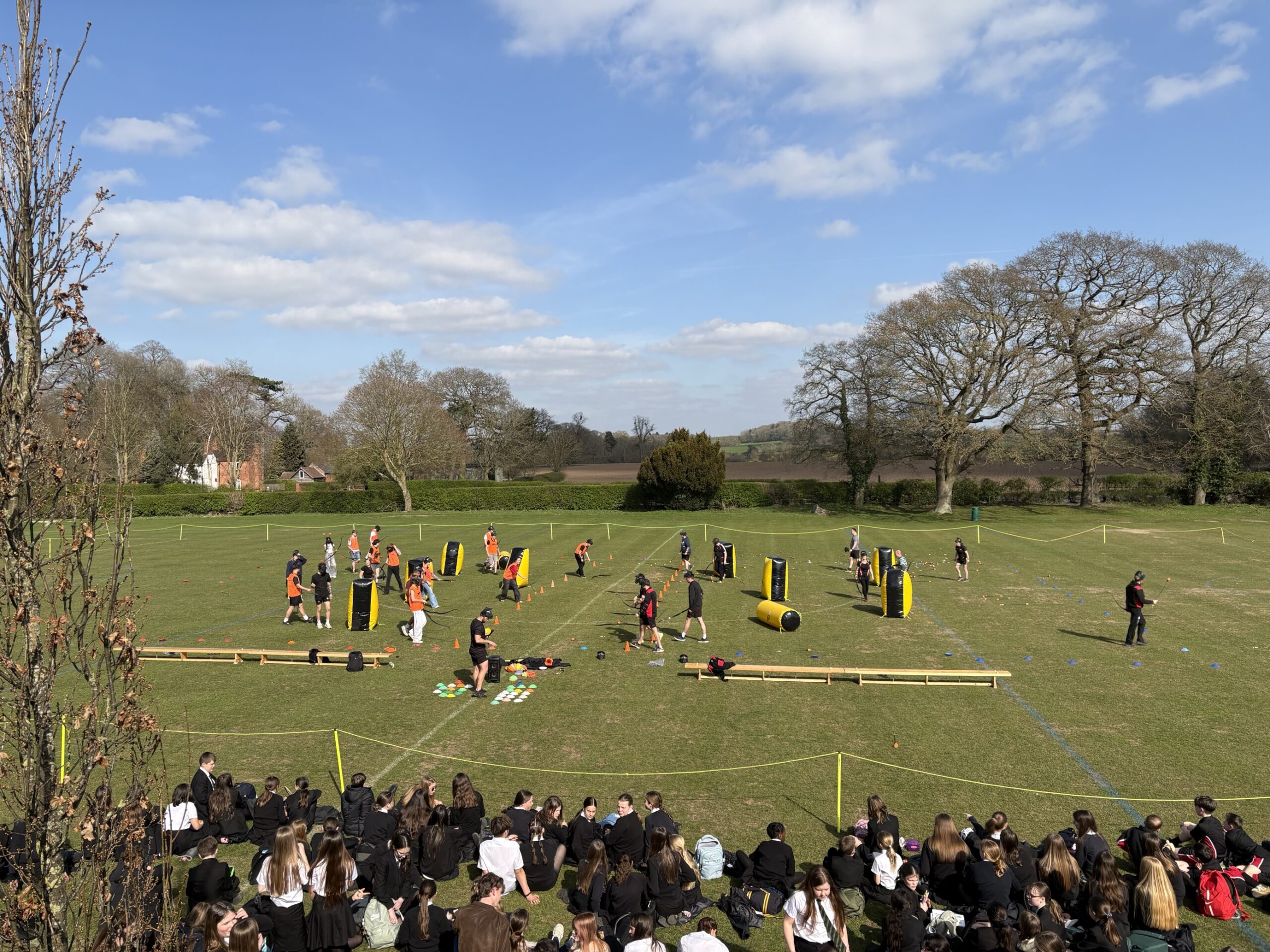 A photo of the archery tag battle between students and teachers