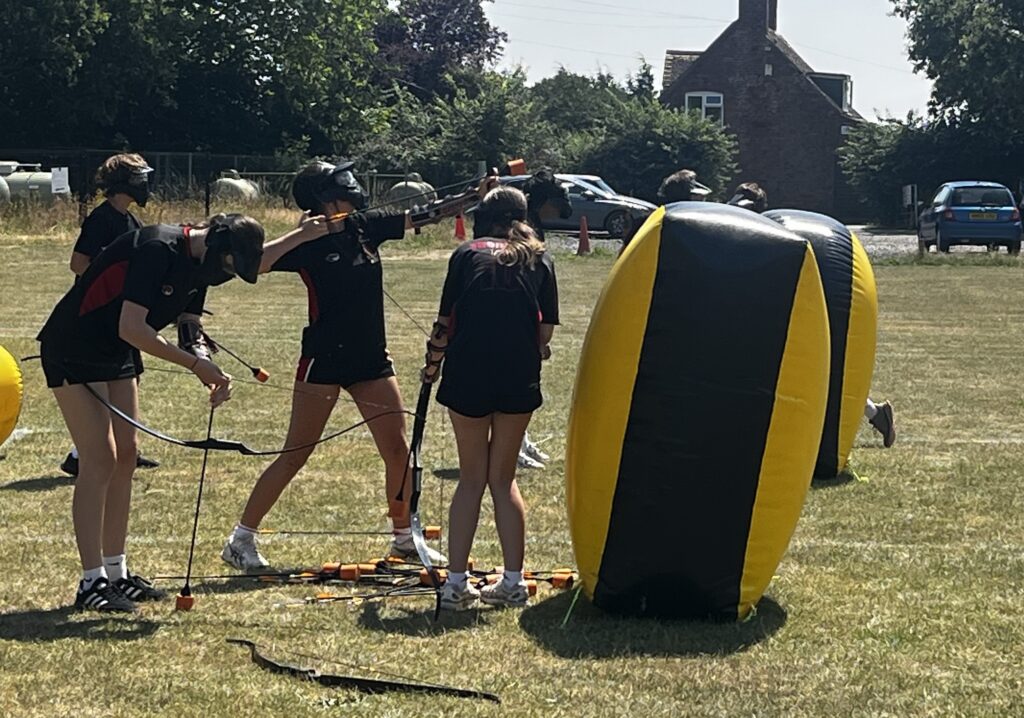 Pupils during archery tag at Hanley High School